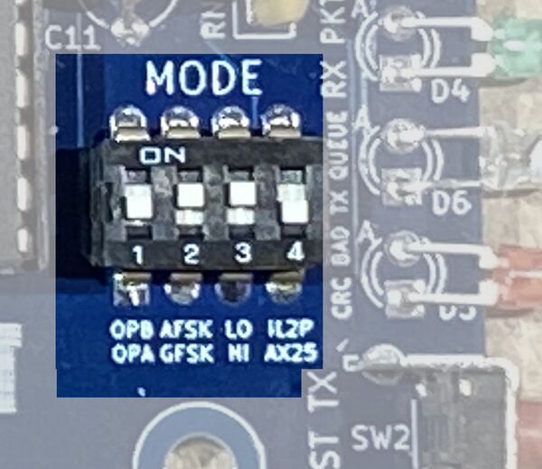 Photo showing bottom DIP switches on a NinoTNC PCB